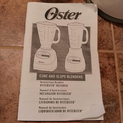 OSTER 14 SPEED BLENDER AND A COFFEE BEAN GRINDER