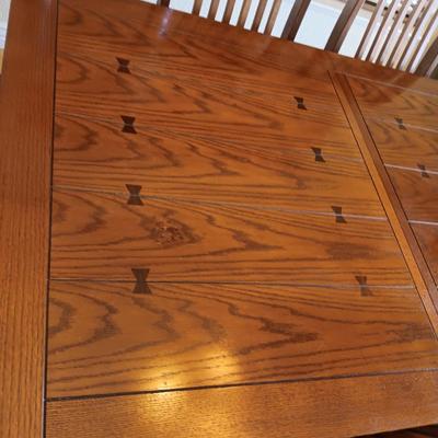 NICE MISSION STYLE DINING TABLE WITH 2 ARM CHAIRS AND 4 REG CHAIRS PLUS 1 LEAF