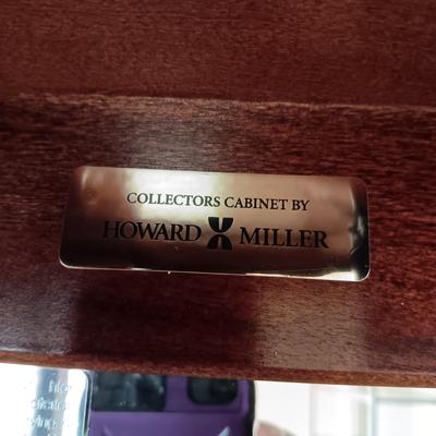 HOWARD MILLER LIGHTED NARROW CURIO CABINET WITH MIRRORED BACK