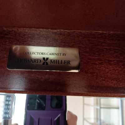 HOWARD MILLER LIGHTED NARROW CURIO CABINET WITH MIRRORED BACK