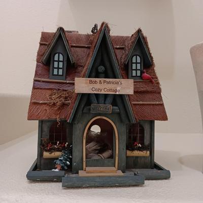 WOODEN BIRDHOUSE AND A CERAMIC VASE
