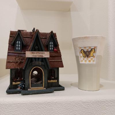WOODEN BIRDHOUSE AND A CERAMIC VASE