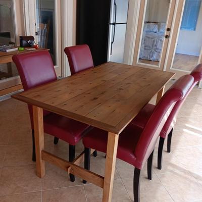 KNOTTY RUSTIC WOODEN TABLE WITH 4 VINYL COVERED CHAIRS