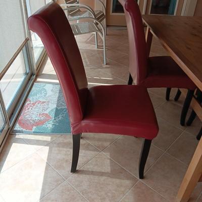 KNOTTY RUSTIC WOODEN TABLE WITH 4 VINYL COVERED CHAIRS