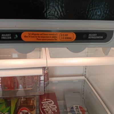 GE STAINLESS STEEL REFRIGERATOR WITH ICEMAKER (CONTENTS NOT INCLUDED)