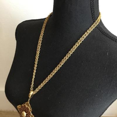 Vintage medallion square chunky tassel necklace red enamel medallion. Very nice.