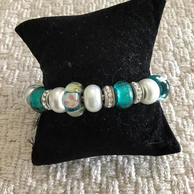 Pretty glass beaded bracelet with palm tree charm