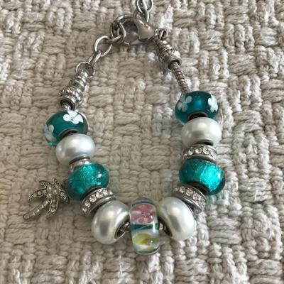 Pretty glass beaded bracelet with palm tree charm