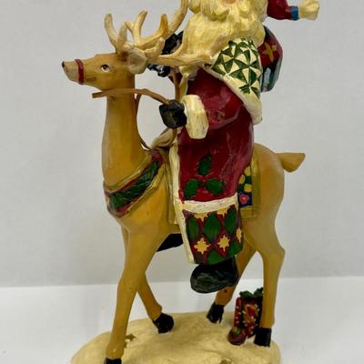 Winterland Collection 2007 by St. Nicholas Square Santa Claus on Reindeer made with resin