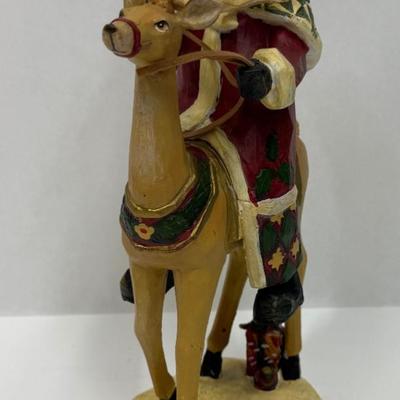 Winterland Collection 2007 by St. Nicholas Square Santa Claus on Reindeer made with resin
