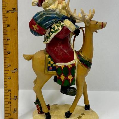 Winterland Collection 2007 by St. Nicholas Square Santa Claus on Reindeer made with resin