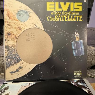 Sale Photo Thumbnail #54: Elvis Presley's Aloha from Hawaii via Satellite, a historic live album released by RCA Records in February 1973. 
Here's more about this iconic album:
Pioneering Satellite Broadcast: This album captures the performance from Elvis Presley's groundbreaking 