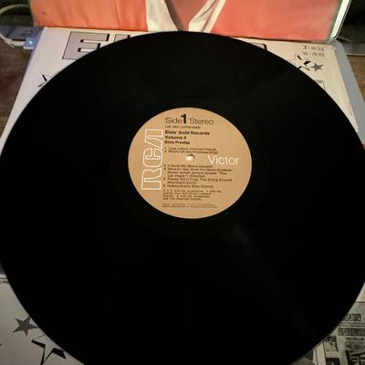 Sale Photo Thumbnail #41: The image shows the album Elvis' Gold Records Volume 4 by Elvis Presley. 
Here is information about this album:
Release Date & Label: RCA Victor released this greatest hits compilation in January 1968, in both mono (LPM 3921) and stereo (LSP 3921) formats