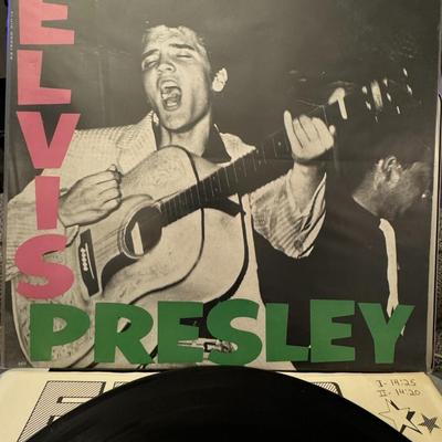 Sale Photo Thumbnail #60: Elvis Presley's self-titled debut album, released by RCA Victor. 
Here's more information about this iconic album:
Title and Artist: The album is simply titled "Elvis Presley" and features the legendary Elvis Presley.
Catalog Number: The specific version 