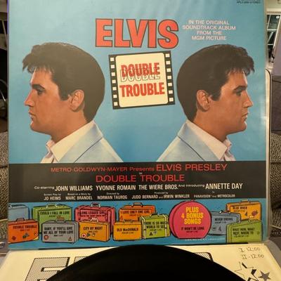 Sale Photo Thumbnail #32: "Double Trouble," an original soundtrack album by Elvis Presley. 
Here is information about the album:
Artist: Elvis Presley.
Album Title: Double Trouble.
Type: Original Soundtrack Album from the MGM Picture "Double Trouble" starring Elvis Presley.
Releas