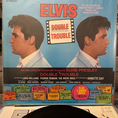Sale Photo Thumbnail #34: "Double Trouble," an original soundtrack album by Elvis Presley. 
Here is information about the album:
Artist: Elvis Presley.
Album Title: Double Trouble.
Type: Original Soundtrack Album from the MGM Picture "Double Trouble" starring Elvis Presley.
Releas