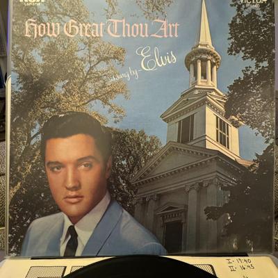 Sale Photo Thumbnail #154: "How Great Thou Art" by Elvis Presley. 
Here's some information about the album:
Release and Genre: "How Great Thou Art" is a gospel album released by RCA Victor in February 1967, and it is considered his ninth studio album.
Critical Acclaim: It earned El