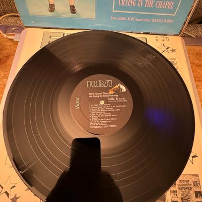 Sale Photo Thumbnail #157: "How Great Thou Art" by Elvis Presley. 
Here's some information about the album:
Release and Genre: "How Great Thou Art" is a gospel album released by RCA Victor in February 1967, and it is considered his ninth studio album.
Critical Acclaim: It earned El