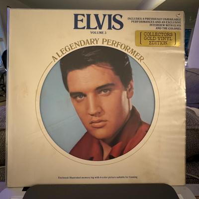 Sale Photo Thumbnail #96: Elvis: A Legendary Performer Volume 3, a compilation album by American singer Elvis Presley. 
Here's some information about this iconic record:
Release and Format: It's a 1978 vinyl LP, part of a series that began with Volume 1 in 1974, and was the first 