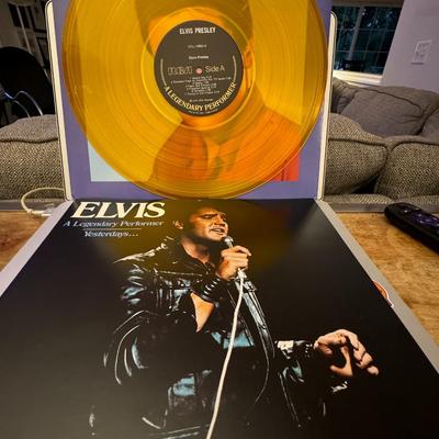 Sale Photo Thumbnail #98: Elvis: A Legendary Performer Volume 3, a compilation album by American singer Elvis Presley. 
Here's some information about this iconic record:
Release and Format: It's a 1978 vinyl LP, part of a series that began with Volume 1 in 1974, and was the first 
