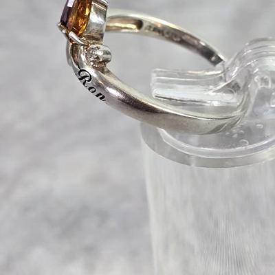 Lot 14: Sterling Silver Wedding Band with Stone - 2g / Ring Size: 8
