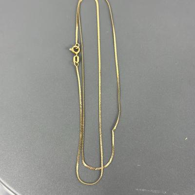 Lot 27: 14k Gold Necklace - 1g