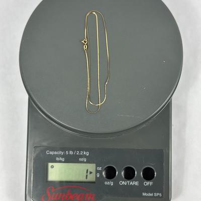 Lot 27: 14k Gold Necklace - 1g