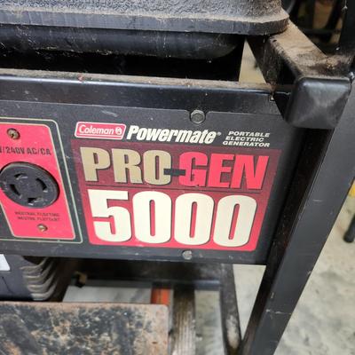 Coleman Powermate Portable Electric Generator ProGen 5000 w Wheel Kit Has Compression