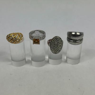 Lot 34: Lot of 4 Rings (Costume) / Ring Sizes Vary 6, 6.5, 7