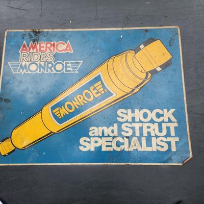 America Rides Monroe Shock & Struts Double Sided Metal Sign