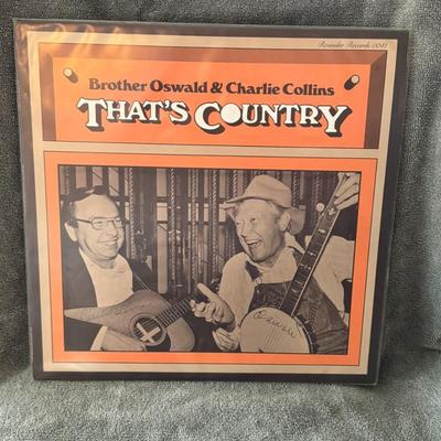 Sale Photo Thumbnail #284: "That's Country" by Brother Oswald & Charlie Collins, released on Rounder Records (catalog number 0041). 
This is a vintage vinyl LP album, originally released in 1975, and features musicians Bashful Brother Oswald and Charlie Collins performing tradition