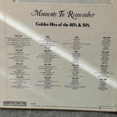 Sale Photo Thumbnail #469: "Moments To Remember Golden Hits Of The 40's & 50's". 
Here's more information about this product:
Format: It is an 8x vinyl LP box set featuring a collection of classic songs from the 1940s and 1950s.
Label: It was released by Columbia Special Products, 