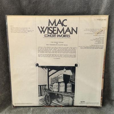 Sale Photo Thumbnail #319: "Concert Favorites" by Mac Wiseman, a country and bluegrass artist. This is a vinyl LP album released in 1973 by RCA Victor. 
Album Details:
Artist: Mac Wiseman
Title: Concert Favorites
Label: RCA Victor
Format: Vinyl LP, Album, Stereo
Release Year: 1973
