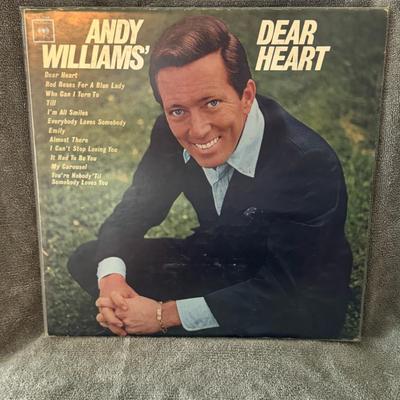 Sale Photo Thumbnail #282: Andy Williams' Dear Heart, a classic vinyl LP.
Here is some information:
Artist: Andy Williams, an American singer known for his smooth voice and easy-listening style.
Album Title: Dear Heart.
Release Year & Label: The album was released in 1965 on Columb