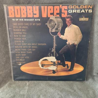 Sale Photo Thumbnail #458: Bobby Vee's Golden Greats, a compilation album by American singer Bobby Vee. 
Here's some information about this album:
Artist: Bobby Vee.
Album Title: Bobby Vee's Golden Greats.
Release Year: The album was released in November 1962.
Record Label: It was 