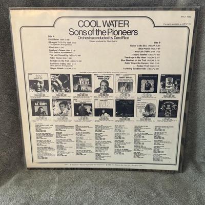 Sale Photo Thumbnail #385: "Cool Water" by Sons of the Pioneers, released on the RCA Records label. 
About the Album:
Artist: The Sons of the Pioneers were a legendary American Western vocal group known for their harmonious sound and cowboy-themed songs, founded by Roy Rogers in 19