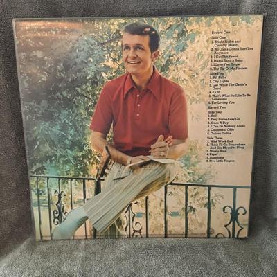 Sale Photo Thumbnail #387: "The Bill Anderson Story: His Greatest Hits," a compilation album by American country music singer-songwriter Bill Anderson. 
Details about the album:
Artist: Bill Anderson.
Album Title: The Bill Anderson Story: His Greatest Hits.
Release Information: Ori