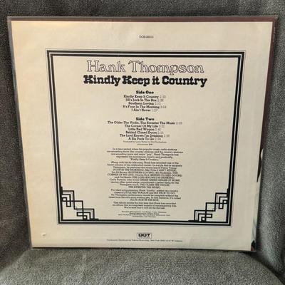 Sale Photo Thumbnail #291: "Kindly Keep It Country" by Hank Thompson. 
Here's some information about the album:
Artist & Title: Hank Thompson – Kindly Keep It Country.
Label & Release Year: Released on Dot Records in 1973.
Genre: It's a country music album featuring Thompson's si