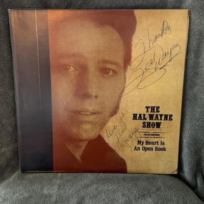 Sale Photo Thumbnail #300: "THE HAL WAYNE SHOW FEATURING My Heart Is An Open Book" by the artist Hal Wayne. The album cover also appears to be autographed by Hal Wayne. 
Here's some information about this record:
Artist: Hal Wayne.
Title: The Hal Wayne Show featuring My Heart Is An