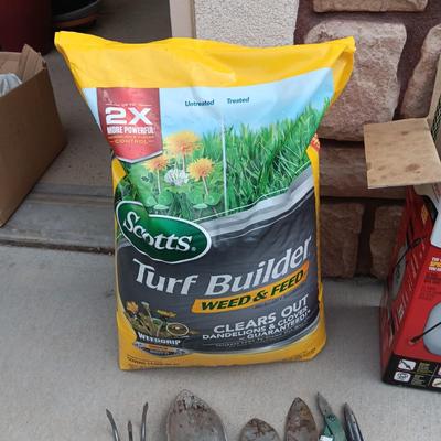 NEW BAG OF TURF BUILDER, WEED SPRAYER AND GARDEN TOOLS