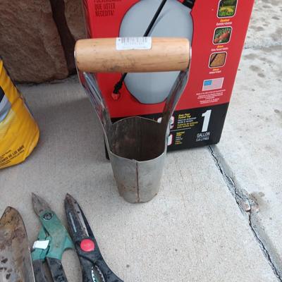 NEW BAG OF TURF BUILDER, WEED SPRAYER AND GARDEN TOOLS