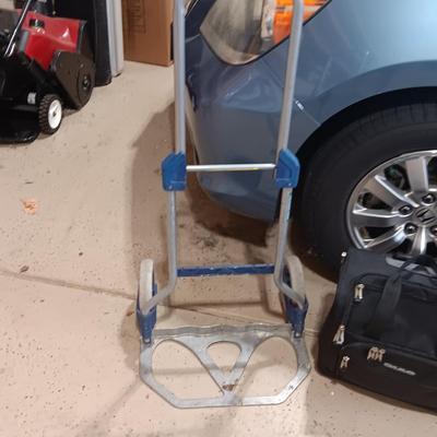 FOLDING DOLLY AND A CARRY-ON BAG WITH WHEELS