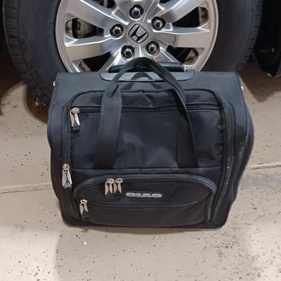 FOLDING DOLLY AND A CARRY-ON BAG WITH WHEELS