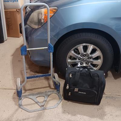 FOLDING DOLLY AND A CARRY-ON BAG WITH WHEELS