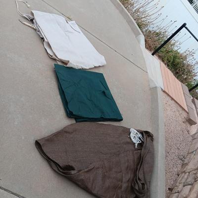 2 TRIANGLE SHADE TARPS AND SOME OUTDOOR MATERIAL