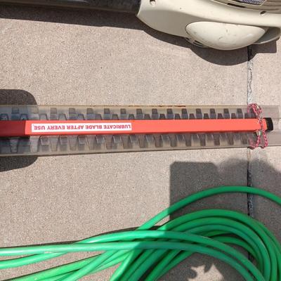 LEAF BLOWER, HEDGE TRIMMER, NICE EXTENSION CORD AND 2 RAKES