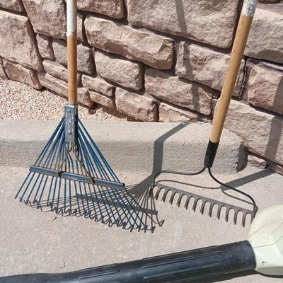 LEAF BLOWER, HEDGE TRIMMER, NICE EXTENSION CORD AND 2 RAKES