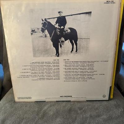 Sale Photo Thumbnail #237: "The Best of Bob Wills" by Bob Wills & His Texas Playboys. 
This compilation album showcases some of the iconic Western Swing artist's greatest hits, released by MCA Records. Different pressings of this album exist, with some sources indicating a release 
