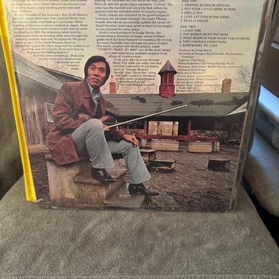 Sale Photo Thumbnail #401: "Country Music My Way" by Shoji Tabuchi. 
Here's some information about this album:
Artist: Shoji Tabuchi, a renowned Japanese-born country music fiddler and entertainer.
Album Title: Country Music My Way.
Release Year: 1975.
Record Label: ABC/Dot.
Genre: