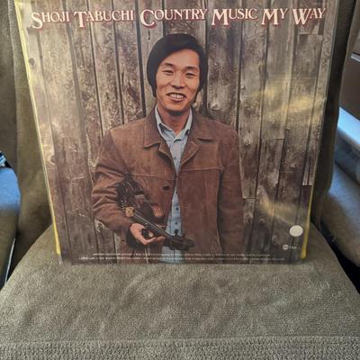 Sale Photo Thumbnail #400: "Country Music My Way" by Shoji Tabuchi. 
Here's some information about this album:
Artist: Shoji Tabuchi, a renowned Japanese-born country music fiddler and entertainer.
Album Title: Country Music My Way.
Release Year: 1975.
Record Label: ABC/Dot.
Genre: